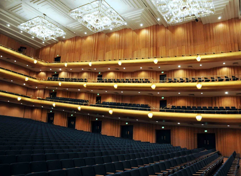Tiers of wood-clad balcony fronts rising through Abravanel Hall