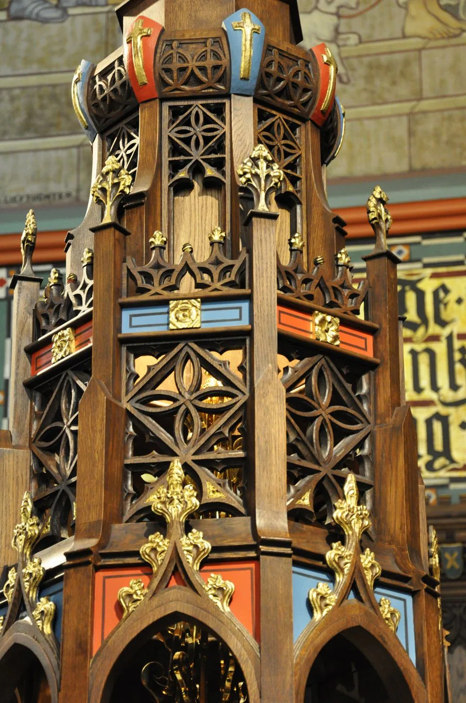 Carved and painted gothic pinnacle with gilded crockets at the Cathedral of the Madeleine