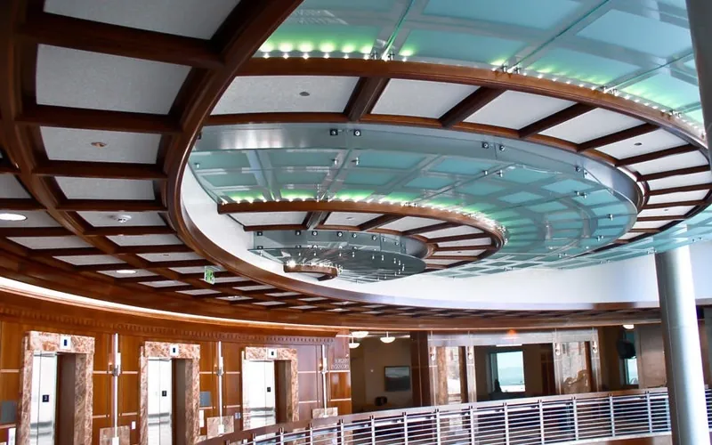 Curved wood ceiling grid above a rotunda at Huntsman Cancer Institute