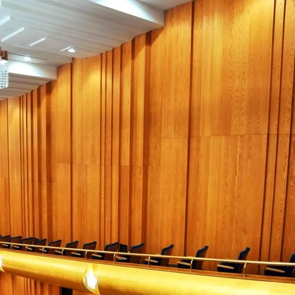 Vertical oak wall paneling in the grand hall at Abravanel Hall