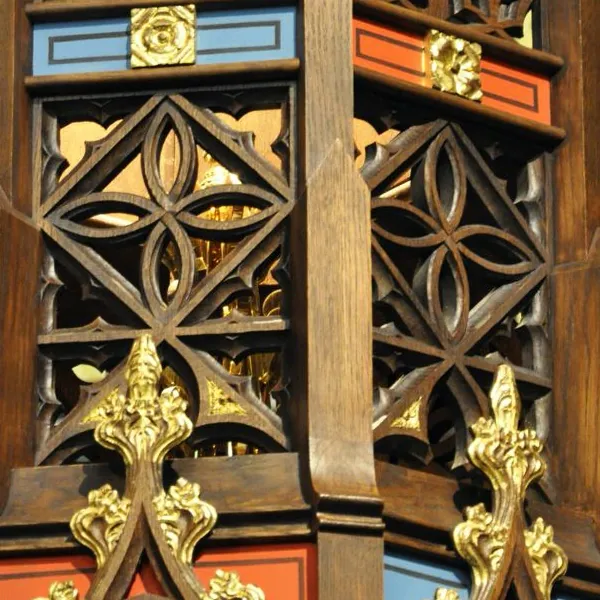 Carved gothic tracery with gold leaf detail at the Cathedral of the Madeleine
